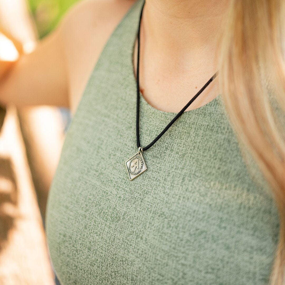 women wearing appalachian trail logo necklace in black paracord