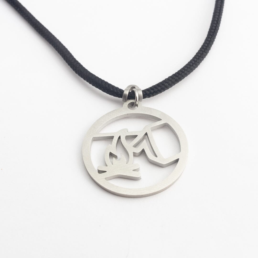 Stainless steel campfire pendant on black paracord