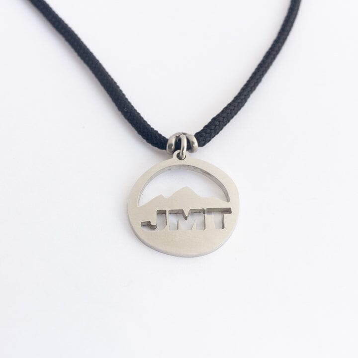 Stainless steel john muir trail pendant on black paracord