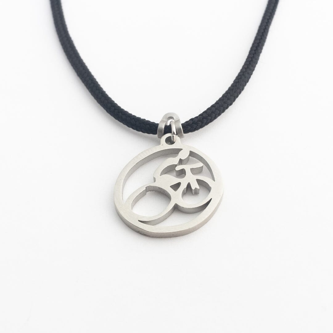 Stainless steel mountain bike pendant on black paracord