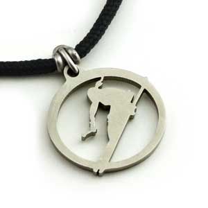 Close-up of the skier silhouette pendant in recycled 316L stainless steel