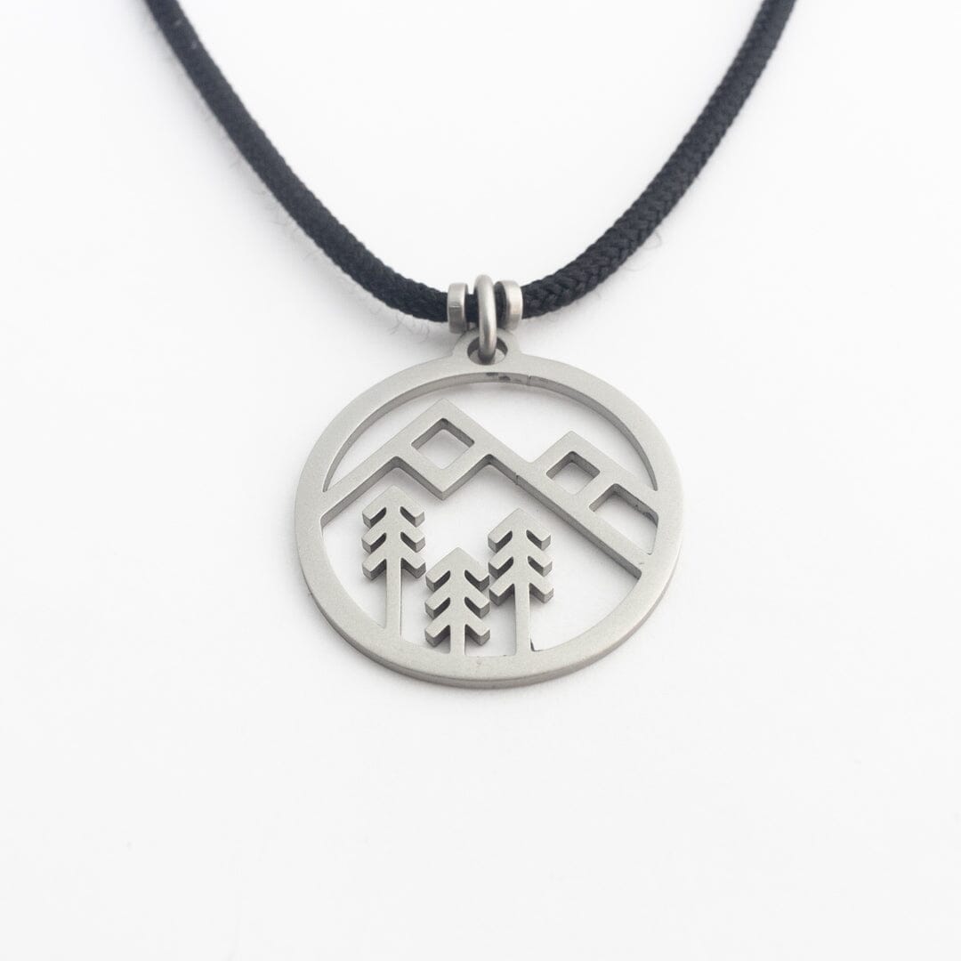 Stainless steel mountain pendant on black paracord