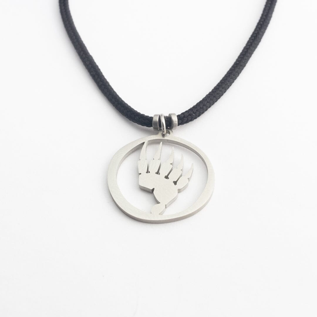 Stainless steel grizzly bear paw pendant on black paracord
