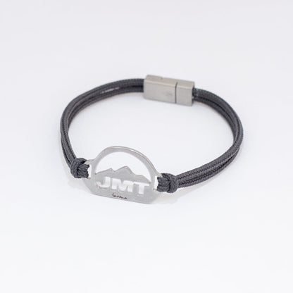 Stainless steel john muir trail bracelet on slate paracord